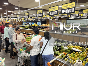 Shoppers are purchasing groceries at the Pothy's market in Thiruvananthapuram (Trivandrum), Kerala, India, on April 08, 2024. Inflation in I...