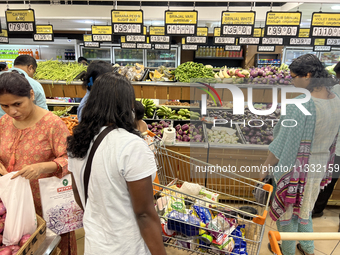 Shoppers are purchasing groceries at the Pothy's market in Thiruvananthapuram (Trivandrum), Kerala, India, on April 08, 2024. Inflation in I...