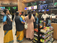 Women are purchasing groceries at the Pothy's market in Thiruvananthapuram (Trivandrum), Kerala, India, on April 08, 2024. (