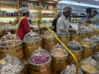 Shoppers are purchasing sweets and candies at the Pothy's market in Thiruvananthapuram (Trivandrum), Kerala, India, on April 08, 2024. Infla...