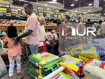 Shoppers are purchasing groceries at the Pothy's market in Thiruvananthapuram (Trivandrum), Kerala, India, on April 08, 2024. Inflation in I...