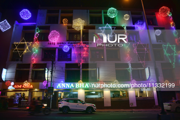 Lights are illuminating a newly-opened vegetarian restaurant in Thiruvananthapuram (Trivandrum), Kerala, India, on April 03, 2024. 