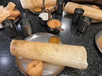 Masala dosa and vada are being served at a vegetarian restaurant in Thiruvananthapuram (Trivandrum), Kerala, India, on April 01, 2024. (