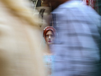 A mannequin is being decorated at a market ahead of the Eid al-Adha festival in Srinagar, India, on June 15, 2024. Eid al-Adha is the holies...