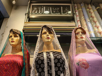 Mannequins are being decorated at a market ahead of the Eid al-Adha festival in Srinagar, India, on June 15, 2024. Eid al-Adha is the holies...