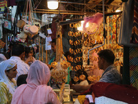 Women are shopping at a jewellery store ahead of the Eid al-Adha festival in Srinagar, India, on June 15, 2024. Eid al-Adha is the holiest o...