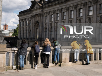 People are enjoying their time near the Spree River in Berlin, Germany, on June 15, 2024. (