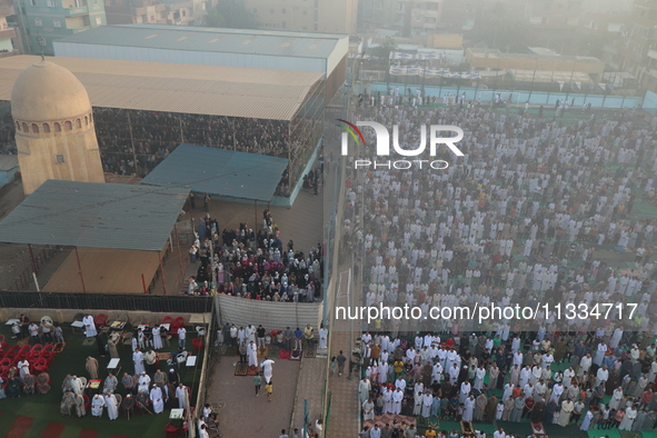 People are gathering at the club to perform Eid prayers in the village of Dondit, Dakahlia, on June 16, 2024. 