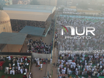 People are gathering at the club to perform Eid prayers in the village of Dondit, Dakahlia, on June 16, 2024. (