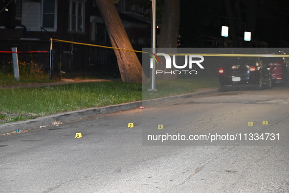 Evidence markers placed at the crime scene where shell casings were located as a Rideshare driver was shot and carjacked in Chicago, Illinoi...