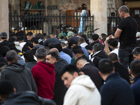 Muslims are praying in front of the Central Mosque of Sofia - Banya Bashi Mosque, marking and celebrating the holiday of Eid al Adha in Sofi...