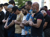 Muslims are praying in front of the Central Mosque of Sofia - Banya Bashi Mosque, marking and celebrating the holiday of Eid al Adha in Sofi...