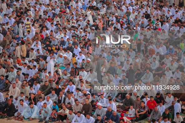 People are gathering to perform Eid prayers on one of the hills in the village of Abu Sir, in the middle of some of the ancient archaeologic...