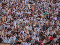 People are gathering to perform Eid prayers on one of the hills in the village of Abu Sir, in the middle of some of the ancient archaeologic...