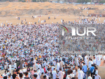 People are gathering to perform Eid prayers on one of the hills in the village of Abu Sir, in the middle of some of the ancient archaeologic...