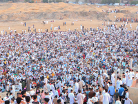 People are gathering to perform Eid prayers on one of the hills in the village of Abu Sir, in the middle of some of the ancient archaeologic...