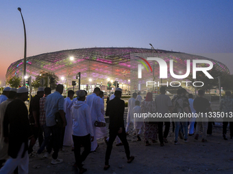 Muslim worshippers are arriving for the Eid al-Adha morning prayers at the Education City Stadium on the first day of the Eid al-Adha holida...