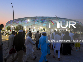 Muslim worshippers are arriving for the Eid al-Adha morning prayers at the Education City Stadium on the first day of the Eid al-Adha holida...