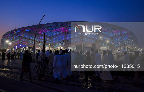 Muslim worshippers are arriving for the Eid al-Adha morning prayers at the Education City Stadium on the first day of the Eid al-Adha holida...