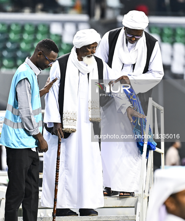 Muslim worshippers are arriving for the Eid al-Adha morning prayers at the Education City Stadium on the first day of the Eid al-Adha holida...