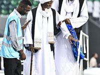 Muslim worshippers are arriving for the Eid al-Adha morning prayers at the Education City Stadium on the first day of the Eid al-Adha holida...