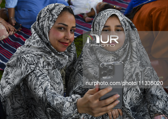 The girls are celebrating after Eid al-Adha morning prayers inside Education City Stadium on the first day of Eid al-Adha holiday in Doha, Q...