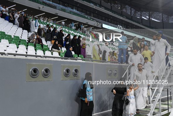 Muslim worshippers are arriving for the Eid al-Adha morning prayers at the Education City Stadium on the first day of the Eid al-Adha holida...