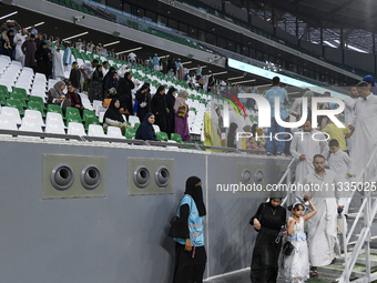 Muslim worshippers are arriving for the Eid al-Adha morning prayers at the Education City Stadium on the first day of the Eid al-Adha holida...