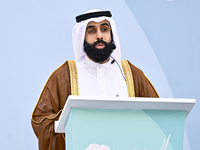 A Qatari imam Ahmed Al-Dosari is giving a sermon in front of worshipers after the Eid al-Adha prayer at the Education City Stadium on the fi...