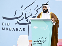 A Qatari imam Ahmed Al-Dosari is giving a sermon in front of worshipers after the Eid al-Adha prayer at the Education City Stadium on the fi...