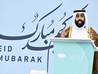 A Qatari imam Ahmed Al-Dosari is giving a sermon in front of worshipers after the Eid al-Adha prayer at the Education City Stadium on the fi...