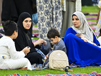 People are gathering after Eid al-Adha morning prayer at the Education City Stadium on the first day of the Eid al-Adha holiday in Doha, Qat...