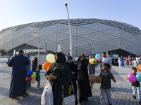 Worshipers are leaving the stadium after performing the Eid al-Adha morning prayer on the first day of the Eid al-Adha holiday in Doha, Qata...