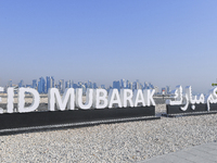 Eid Mubarak decorations are being displayed at Old Doha Port as part of the Eid celebrations in Doha, Qatar, on June 16, 2024. Muslims aroun...