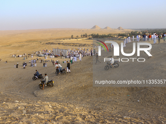 People are performing Eid al-Adha prayers in the village of Abu Sir, Giza, Egypt, on June 16, 2024. (