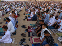 People are performing Eid al-Adha prayers in the village of Abu Sir, Giza, Egypt, on June 16, 2024. (