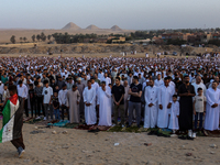 People are performing Eid al-Adha prayers in the village of Abu Sir, Giza, Egypt, on June 16, 2024. (