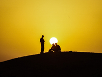 People are performing Eid al-Adha prayers in the village of Abu Sir, Giza, Egypt, on June 16, 2024. (