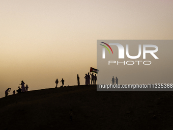 People are performing Eid al-Adha prayers in the village of Abu Sir, Giza, Egypt, on June 16, 2024. (