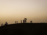 People are performing Eid al-Adha prayers in the village of Abu Sir, Giza, Egypt, on June 16, 2024. (