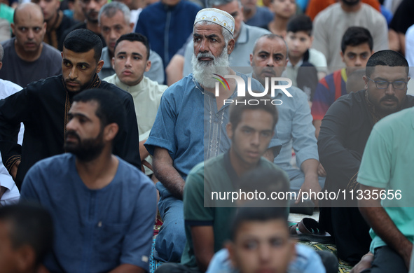 Palestinians are holding Eid al-Adha prayers in Bureij Refugee Camp in the central Gaza Strip, on June 16, 2024, amid the ongoing conflict b...