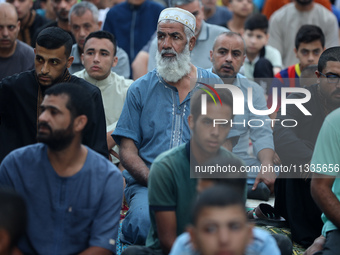 Palestinians are holding Eid al-Adha prayers in Bureij Refugee Camp in the central Gaza Strip, on June 16, 2024, amid the ongoing conflict b...