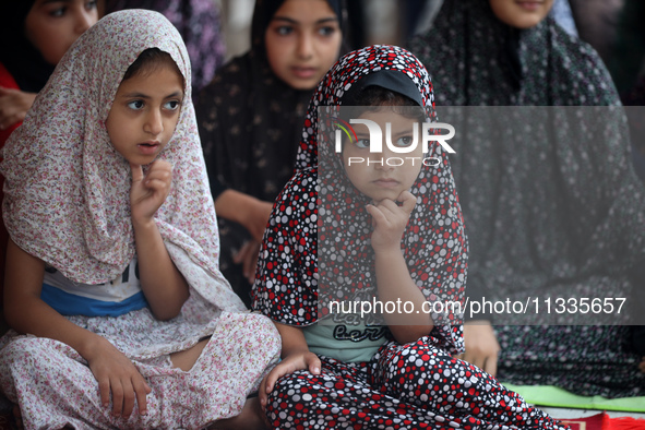 Palestinians are holding Eid al-Adha prayers in Bureij Refugee Camp in the central Gaza Strip, on June 16, 2024, amid the ongoing conflict b...