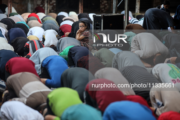 Palestinians are holding Eid al-Adha prayers in Bureij Refugee Camp in the central Gaza Strip, on June 16, 2024, amid the ongoing conflict b...