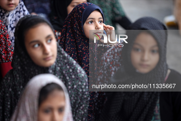 Palestinians are holding Eid al-Adha prayers in Bureij Refugee Camp in the central Gaza Strip, on June 16, 2024, amid the ongoing conflict b...