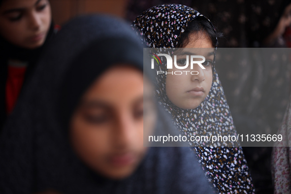 Palestinians are holding Eid al-Adha prayers in Bureij Refugee Camp in the central Gaza Strip, on June 16, 2024, amid the ongoing conflict b...