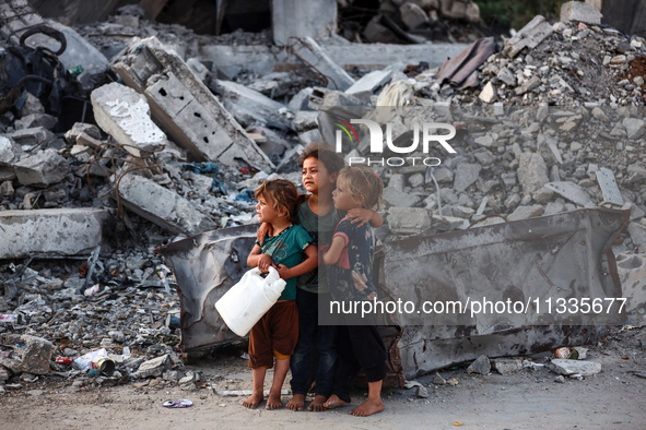 Palestinian girls are attending Eid al-Adha prayers in Bureij Refugee Camp in the central Gaza Strip, on June 16, 2024, amid the ongoing con...