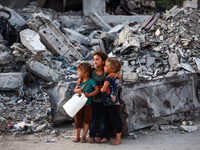 Palestinian girls are attending Eid al-Adha prayers in Bureij Refugee Camp in the central Gaza Strip, on June 16, 2024, amid the ongoing con...