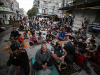 Palestinians are holding Eid al-Adha prayers in Bureij Refugee Camp in the central Gaza Strip, on June 16, 2024, amid the ongoing conflict b...