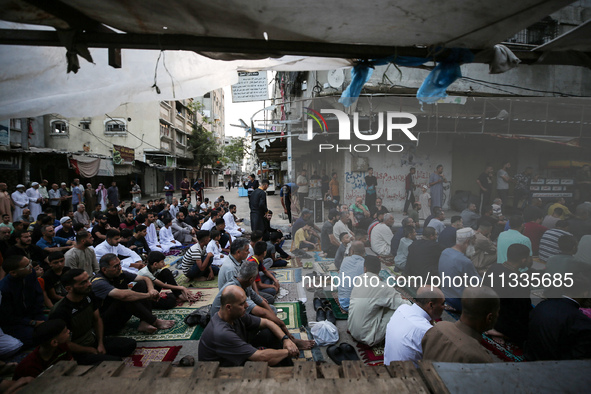 Palestinians are holding Eid al-Adha prayers in Bureij Refugee Camp in the central Gaza Strip, on June 16, 2024, amid the ongoing conflict b...